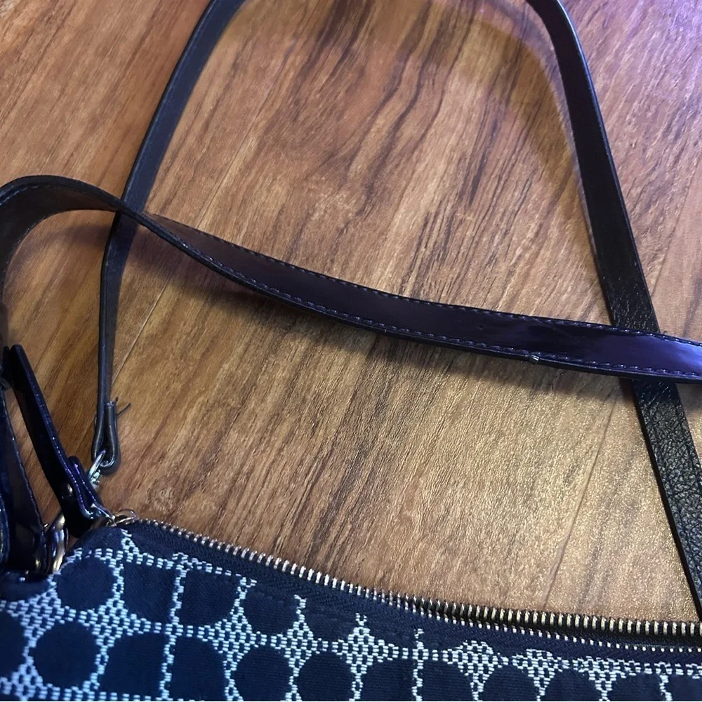 Kate Spade Penn Place Keisha crossbody bag in a black and white dot pattern